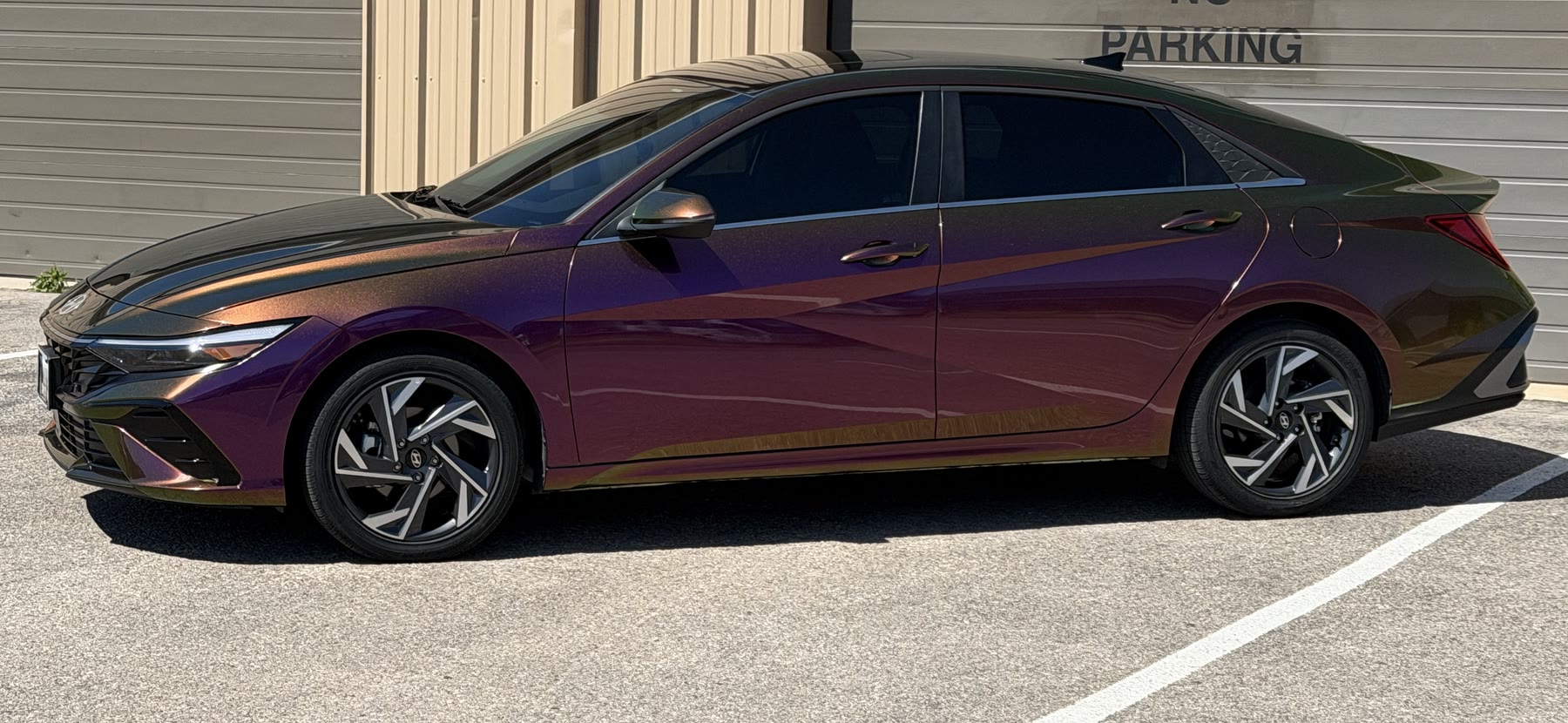 Sedan with a purple, bronze and green color-shifting finish